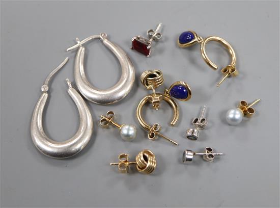 A pair of 9ct gold knot earrings, two other pairs of 9ct gold earrings and three pairs of silver earrings.